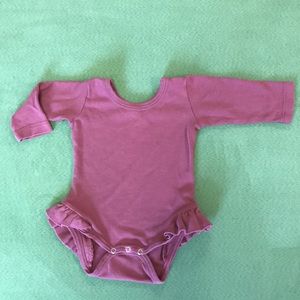 Kate Quinn long sleeve one piece